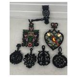 CAST-IRON TRIVETS 4 SMALLER ONES VINTAGE ENESCO &