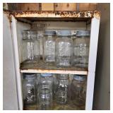 Two Metal Cabinets of Vintage Jars