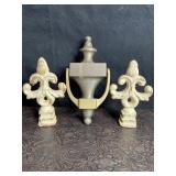 2 CAST-IRON FLEUR-DE-LIS FINIALS & BRASS DOOR