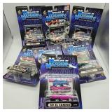 7- MUSCLE MACHINE 1:64 SCALE CARS NOS 2002