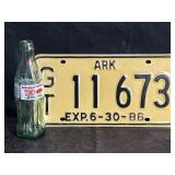 NOS 1986 ARKANSAS LICENSE PLATE & COCA-COLA 100