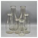 SET OF 6 OLD MILK BOTTLES. QUARTS, PINT & HALF