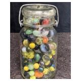 GLASS BALL QT. JAR W/ SNAP LID FULL OF MARBLES