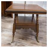 Antique Parlor Table with Brass Feet