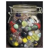 GLASS JAR FULL MARBLES