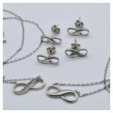 2 NEW INFINITY NECKLACES & 2 PAIRS PEIRCED