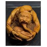 Carved Japanese Netsuke Figurine Man Cradling a