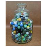 Glass Canister Full Of Marbles