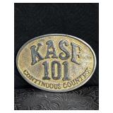KASE 101 CONTINUOUS COUNTRY BRASS BELT BUCKLE