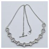 STERLING SILVER ROUND & BAGUETTE DIAMONDCIRCLE