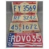 Four US State Bicentennial License Plates