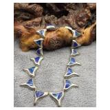 Sterling Silver Whale Tail Necklace & Blue Stone
