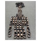 Intricate Geometric Bronze Unn Tangerud Style