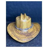 WOOD CARVED COWBOY HAT W/ HAT BAND. CRACK IN