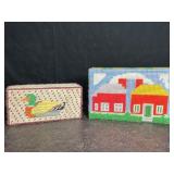 2 NEEDLEPOINT COVERED BRICK DOORSTOPS