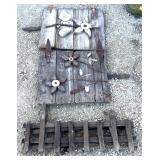 Yard art made out of barn doors