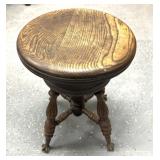 Antique wooden stool with  claw feet