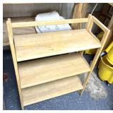 Three tiered wooden shelf