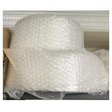Two partial rolls of bubble wrap