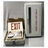 Fire extinguisher holder/exit sign as is