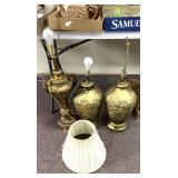 3 vintage gold colored lamps with one shade