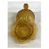 Amber colored butter dish with lid