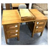 Antique wooden desk, tap currently sitting on