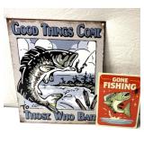 Metal fishing signage.