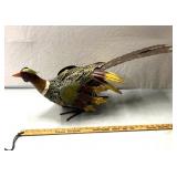 Pheasant themed metal art.