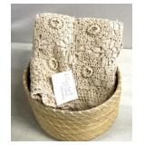 2 crocheted pillow shams with basket