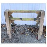 2 wooden saw horses