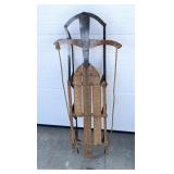Vintage snow sled missing some wood