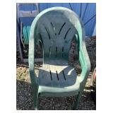 2 stackable green chairs