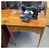 Singer, sewing machine with cabinet