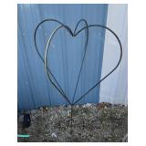 Decorative heart themed metal lawn art