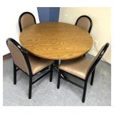 Dining room table and four chairs some ware