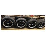 4 custom realms with tires P225/60R 18 Goodyear