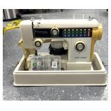 New home sewing machine w/ case