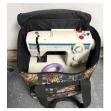 Sewing machine w/ bag