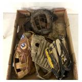Catchers mask/baseball/softball gloves some tears