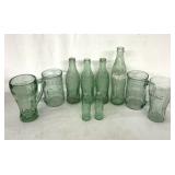 Coca-Cola glass cups and bottles