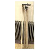 Vintage wooden surveyors, tripod, and measuring