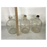 Three glass jugs