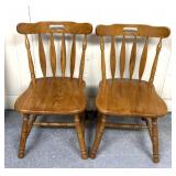 Two wooden kitchen chairs