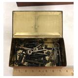 Vintage tin with skeleton keys