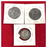 2 silver dollars 1 half see description