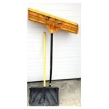 2 plastic snow shovels