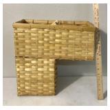 woven stair step storage basket designed to