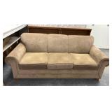 Oversized couch someware