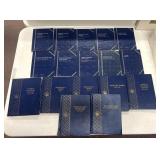 17 used empty coin books someware